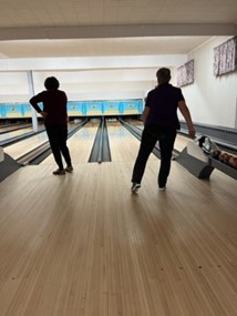 Trefoil Guilds Bowling on lanes.